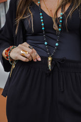 Pantalón Zhara pescador con bolsillos y cintura enresortada - Color Negro